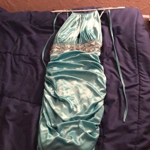 Turquoise tight fitting homecoming/prom dress